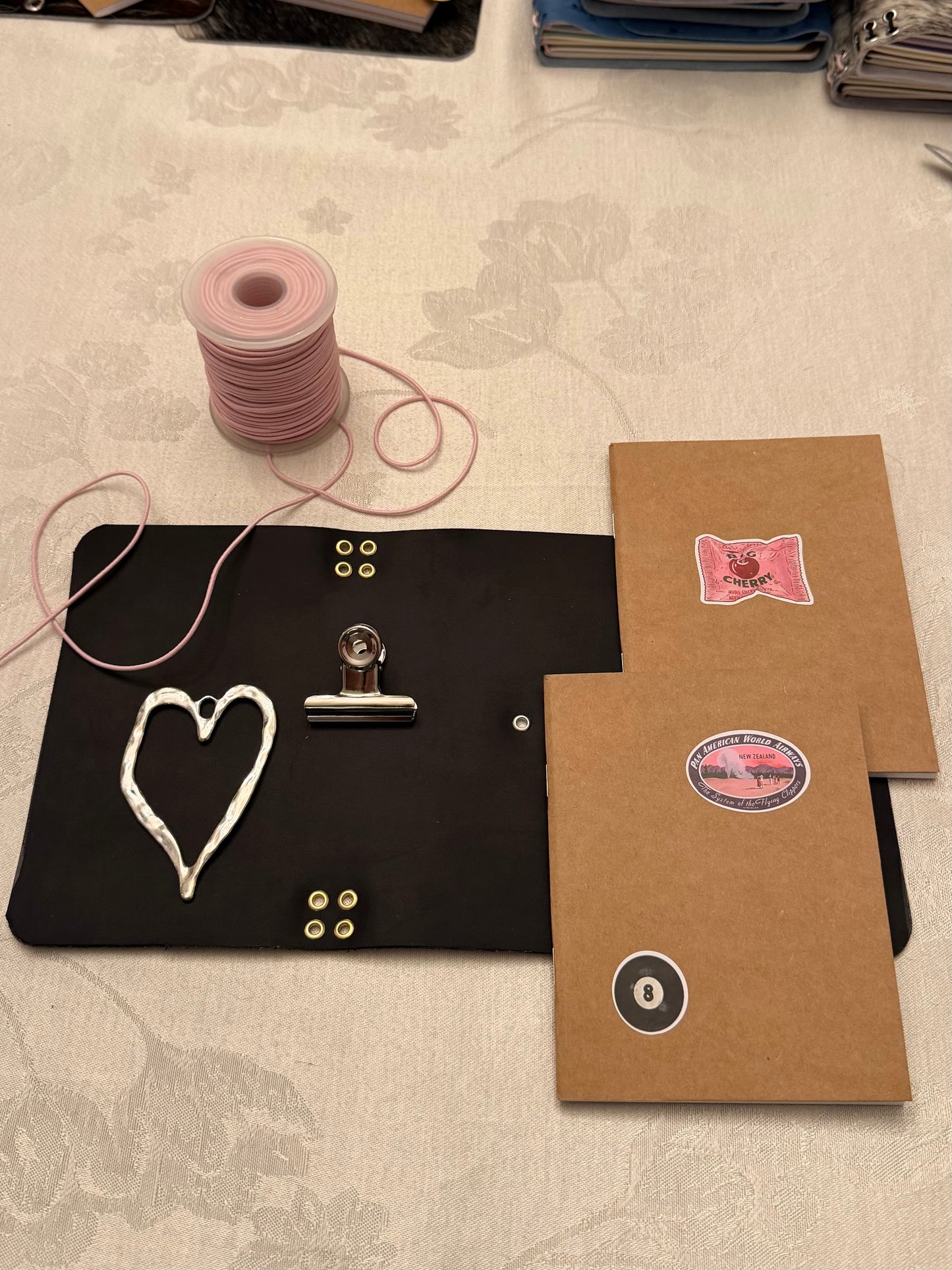 A6 Black Leather Trifold